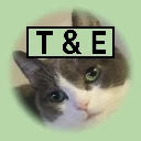 Large logo with cat face and the letters TnE